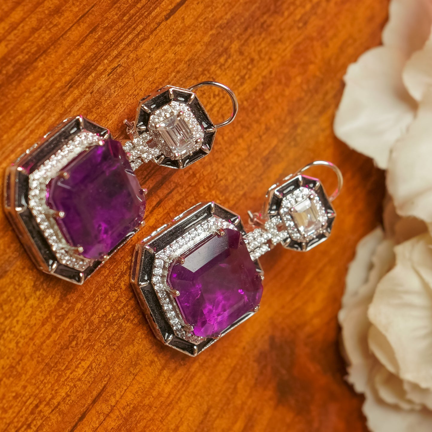 Tanzanite earring in black emerald