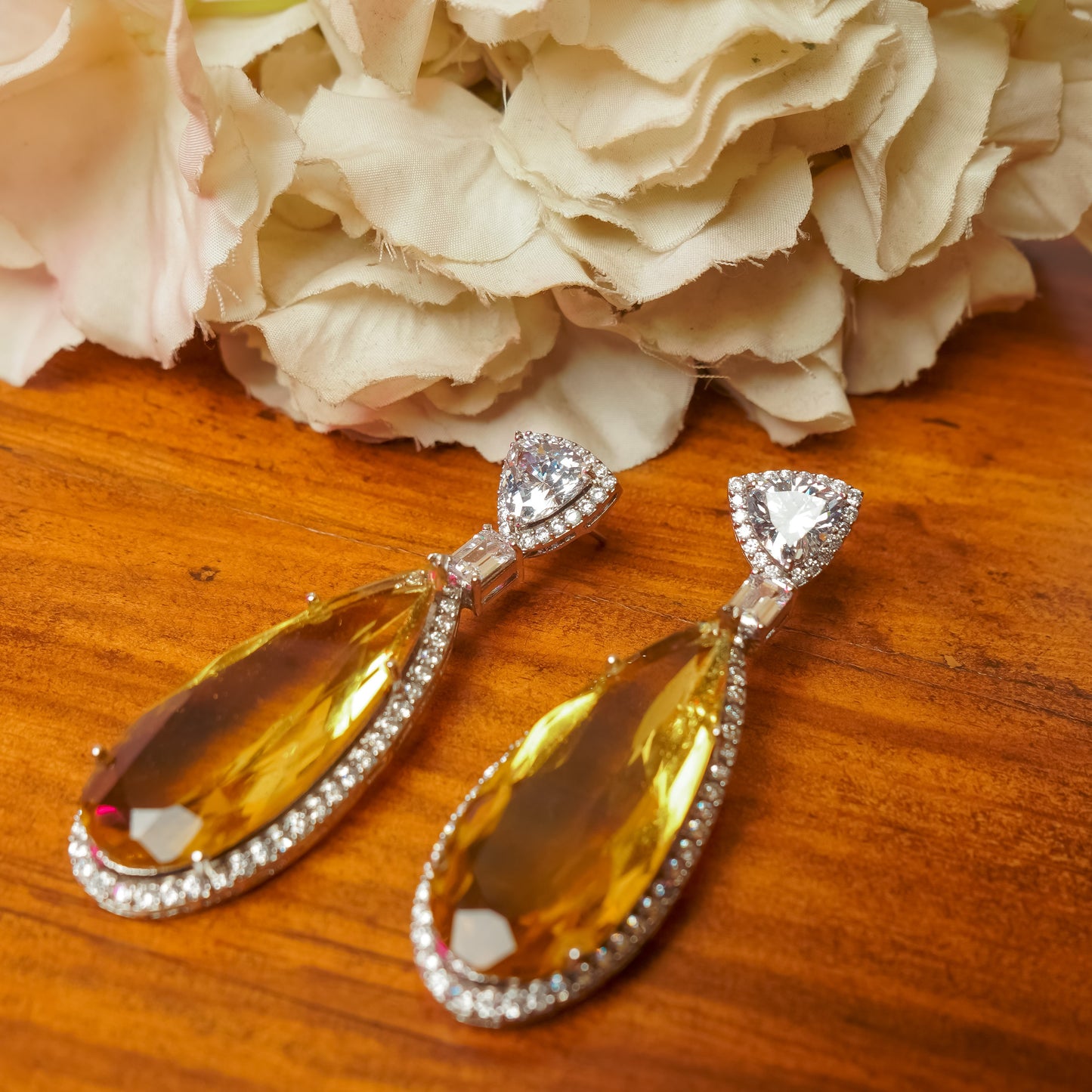 Silver plated yellow swarovski earrings