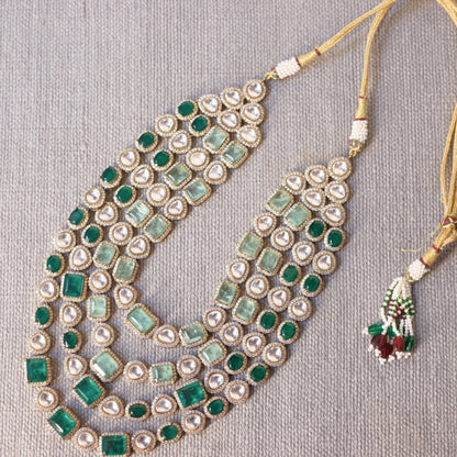 4 line Polki , emerald and Russian emeralds in silver and gold platting