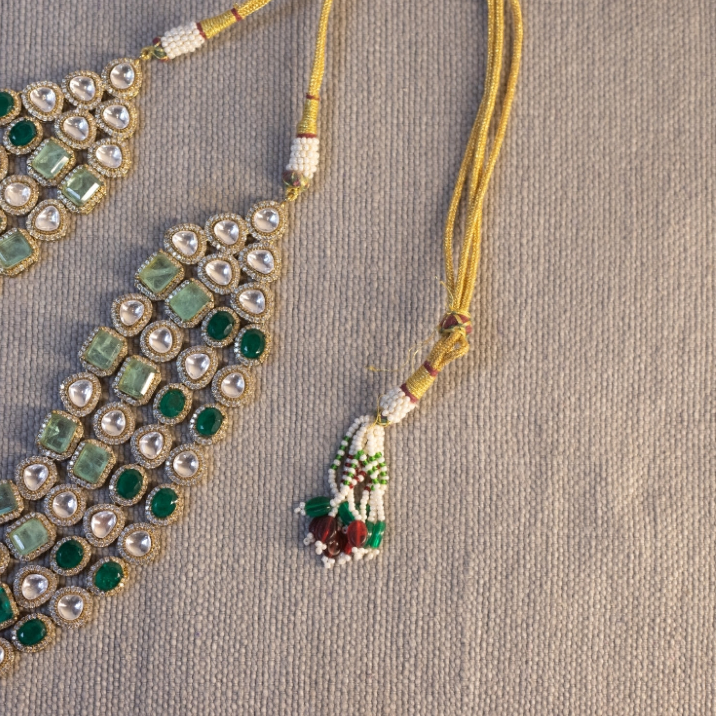 4 line Polki , emerald and Russian emeralds in silver and gold platting