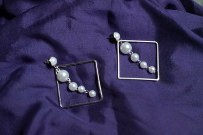 Silver pearl earrings