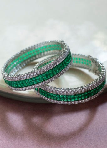 Diamond and emerald bangles