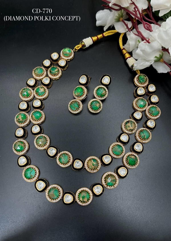 Black Enamel Polki With Emerald Stones